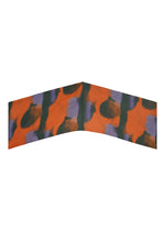 A detail shot of the HOMME PLISSÉ ISSEY MIYAKE DAWN STOLE stole.