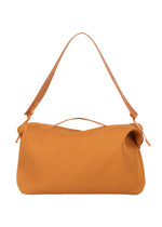 A product shot of the HOMME PLISSÉ ISSEY MIYAKE PLEATS TRAVEL BAG bag in manarola brick brown (47).