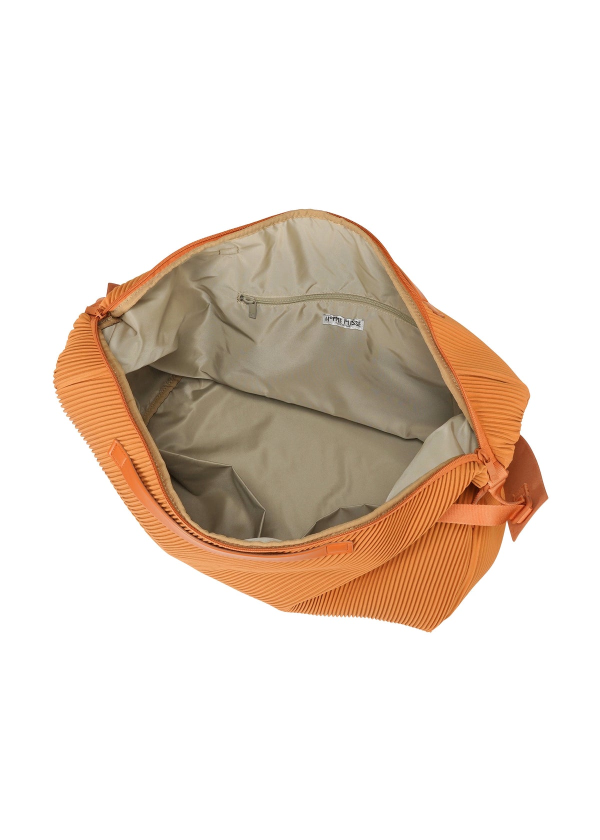 A detail shot of the HOMME PLISSÉ ISSEY MIYAKE PLEATS TRAVEL BAG bag.