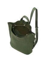 A detail shot of the HOMME PLISSÉ ISSEY MIYAKE DRAWSTRING PLEATS BAG bag.