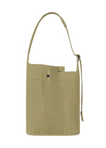 A product shot of the HOMME PLISSÉ ISSEY MIYAKE UTILITY bag in cinque terre rock green grey (68).