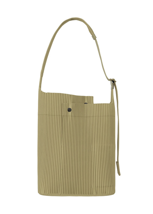 A product shot of the HOMME PLISSÉ ISSEY MIYAKE UTILITY bag in cinque terre rock green grey (68).