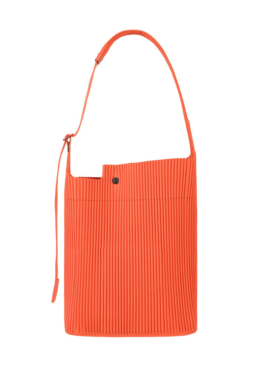 A detail shot of the HOMME PLISSÉ ISSEY MIYAKE UTILITY bag.