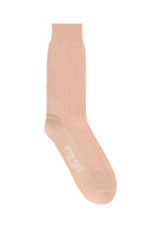 A detail shot of the HOMME PLISSÉ ISSEY MIYAKE STEM SOCKS lingerie & hosiery.