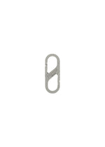 A product shot of the HOMME PLISSÉ ISSEY MIYAKE CARABINER jewellery in silver (91).