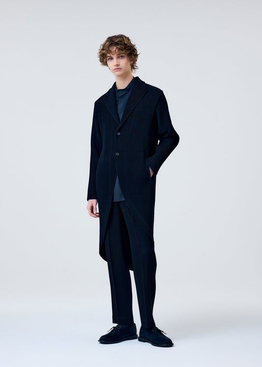 A model wears the HOMME PLISSÉ ISSEY MIYAKE TUXEDO PLEATS jacket.