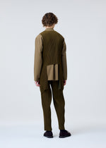 A model wears the HOMME PLISSÉ ISSEY MIYAKE TUXEDO PLEATS vest.