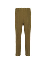 A detail shot of the HOMME PLISSÉ ISSEY MIYAKE TUXEDO PLEATS trousers.
