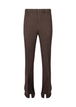 A product shot of the HOMME PLISSÉ ISSEY MIYAKE LINEN LIKE trousers in brown (44).