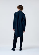 A model wears the HOMME PLISSÉ ISSEY MIYAKE EMBROIDERY PRESS SHIRT shirt.