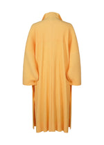 A detail shot of the HOMME PLISSÉ ISSEY MIYAKE WEAR OR WRAP coat.