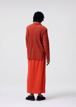A model wears the HOMME PLISSÉ ISSEY MIYAKE TAILORED PLEATS 3 tailored-pleats-3-jacket-duomo-green.