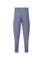 A detail shot of the HOMME PLISSÉ ISSEY MIYAKE MONTHLY COLORS FEBRUARY trousers.