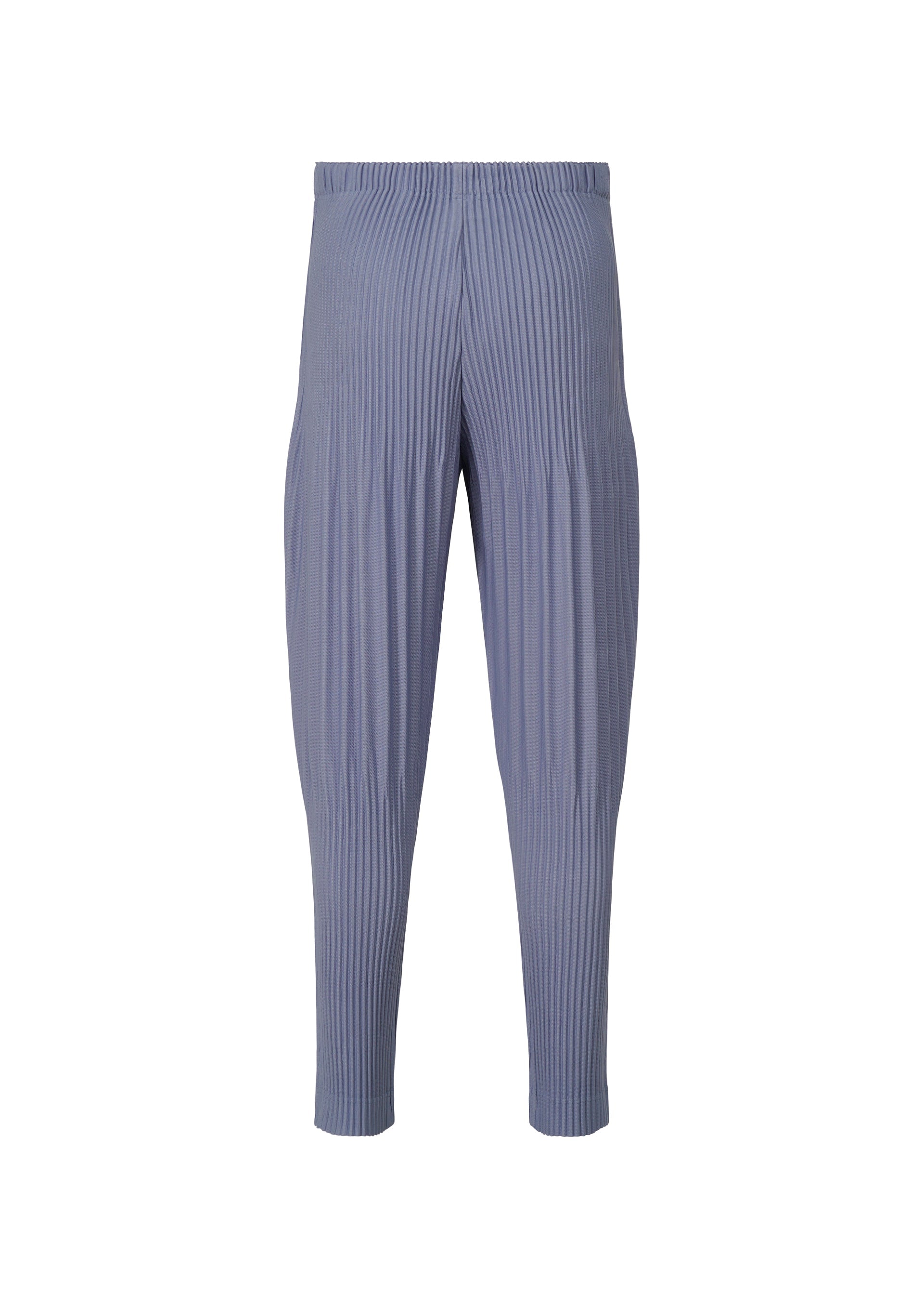 A detail shot of the HOMME PLISSÉ ISSEY MIYAKE MONTHLY COLORS FEBRUARY trousers.