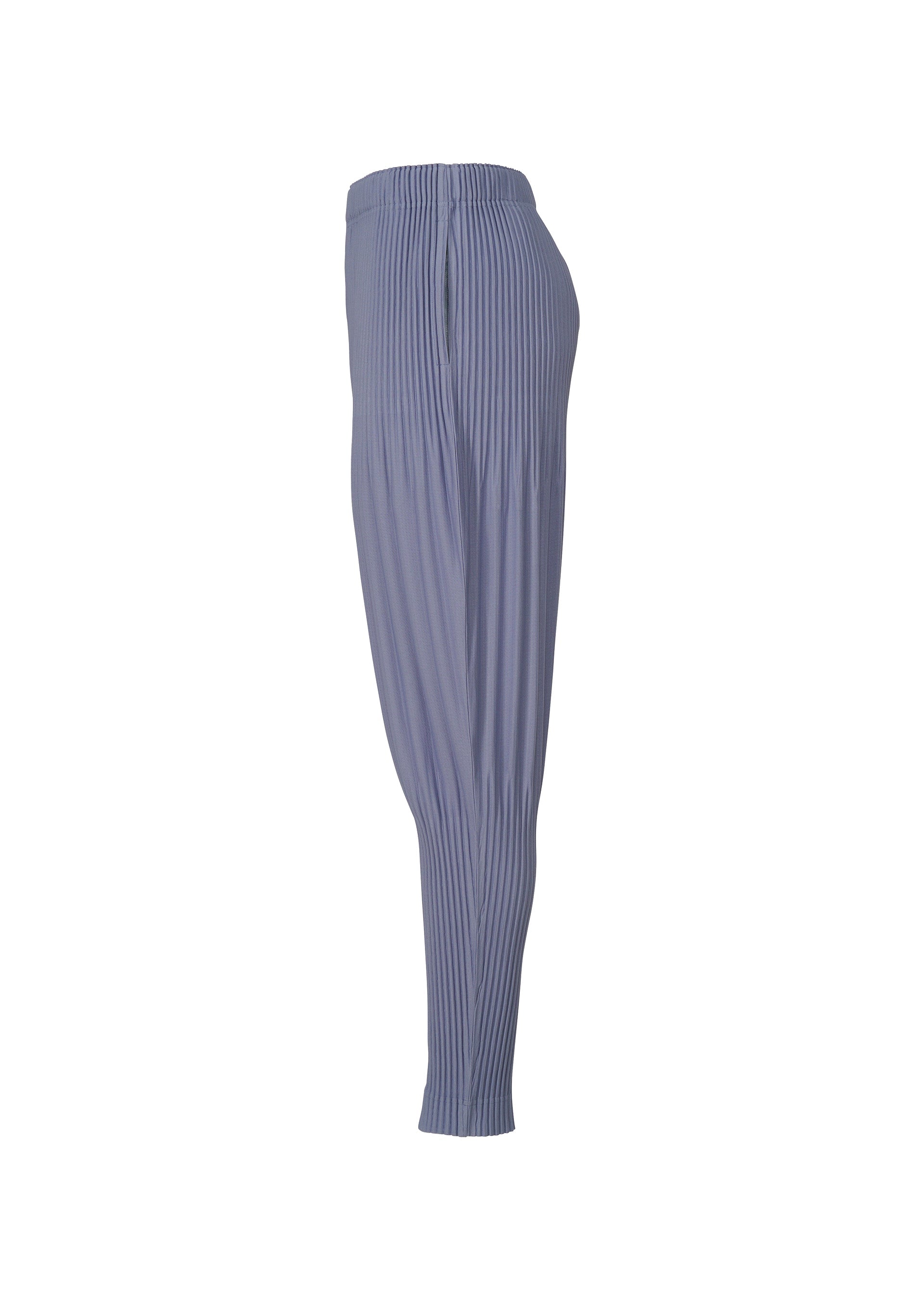 A detail shot of the HOMME PLISSÉ ISSEY MIYAKE MONTHLY COLORS FEBRUARY trousers.