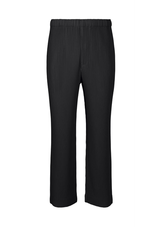 A product shot of the HOMME PLISSÉ ISSEY MIYAKE MONTHLY COLORS MARCH trousers in black (15).