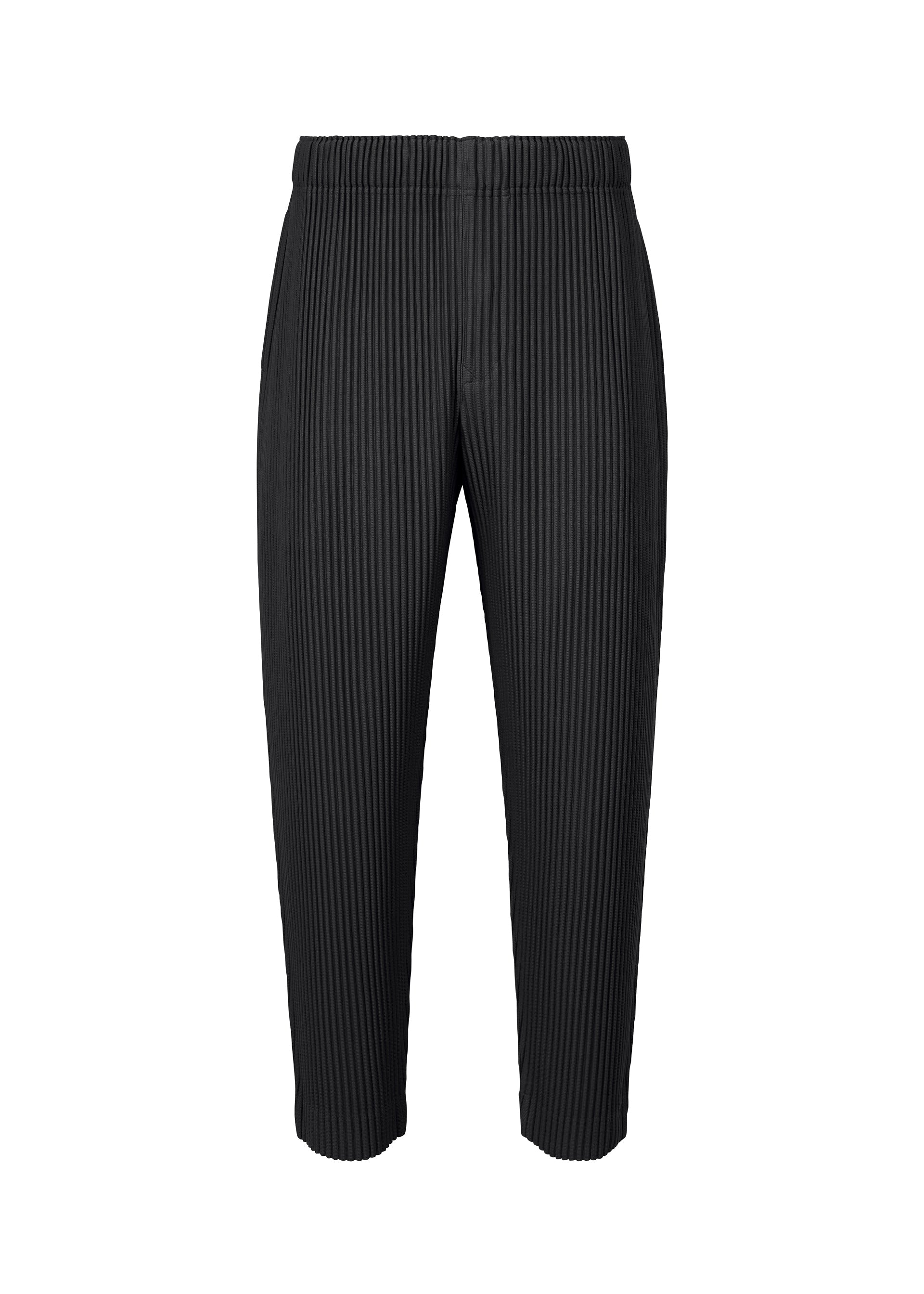 A product shot of the HOMME PLISSÉ ISSEY MIYAKE MONTHLY COLORS APRIL trousers in black (15).
