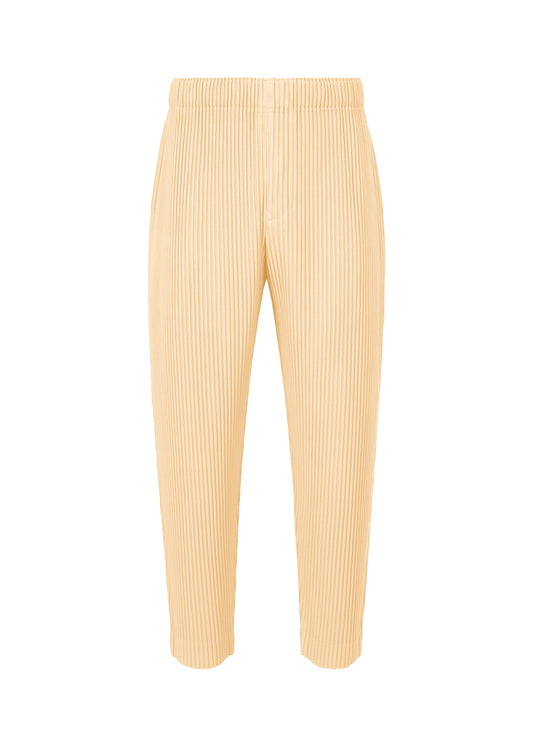 A product shot of the HOMME PLISSÉ ISSEY MIYAKE MONTHLY COLORS APRIL trousers in pizza dough beige (43).