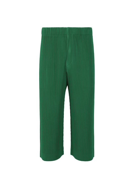 A product shot of the HOMME PLISSÉ ISSEY MIYAKE MONTHLY COLORS MAY trousers in portofino fence green (67).