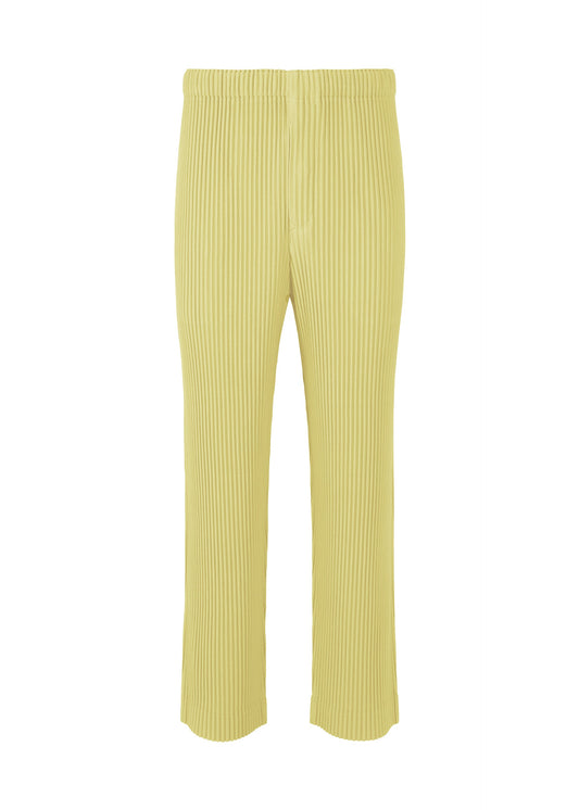 A product shot of the HOMME PLISSÉ ISSEY MIYAKE COLOR PLEATS 2 trousers in agave cream green (64).