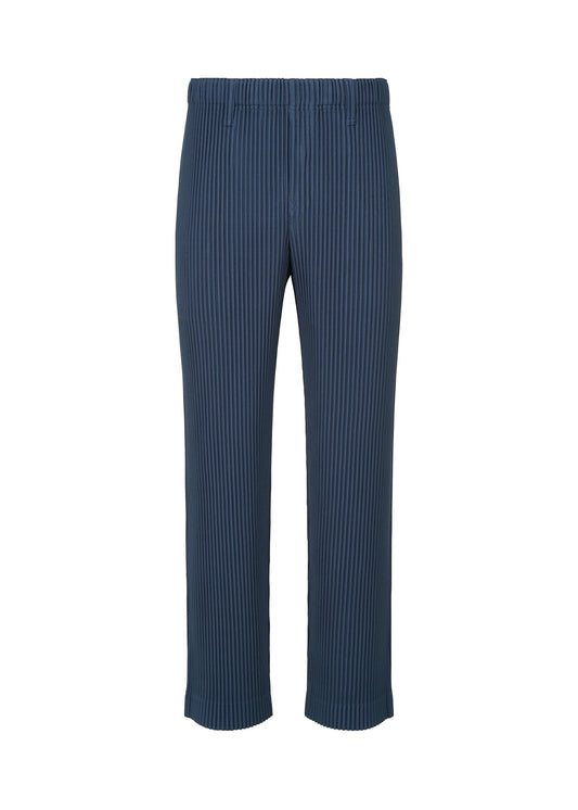 A product shot of the HOMME PLISSÉ ISSEY MIYAKE TAILORED PLEATS 1 trousers in manarola boat navy (76).