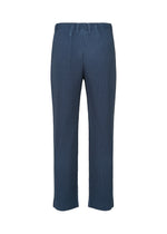 A detail shot of the HOMME PLISSÉ ISSEY MIYAKE TAILORED PLEATS 1 trousers.