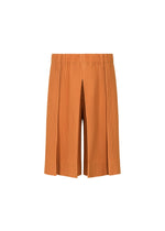 A product shot of the HOMME PLISSÉ ISSEY MIYAKE TAILORED PLEATS 2 trousers in manarola brick brown (47).