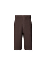 A product shot of the HOMME PLISSÉ ISSEY MIYAKE WEAR OR WRAP trousers in aubergine black (18).