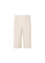 A product shot of the HOMME PLISSÉ ISSEY MIYAKE WEAR OR WRAP trousers in duomo beige (42).