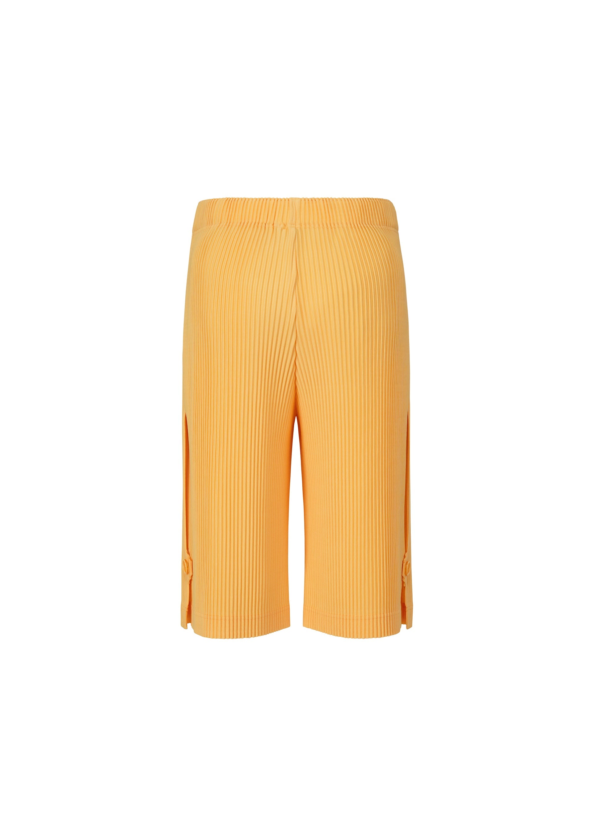 A detail shot of the HOMME PLISSÉ ISSEY MIYAKE WEAR OR WRAP trousers.