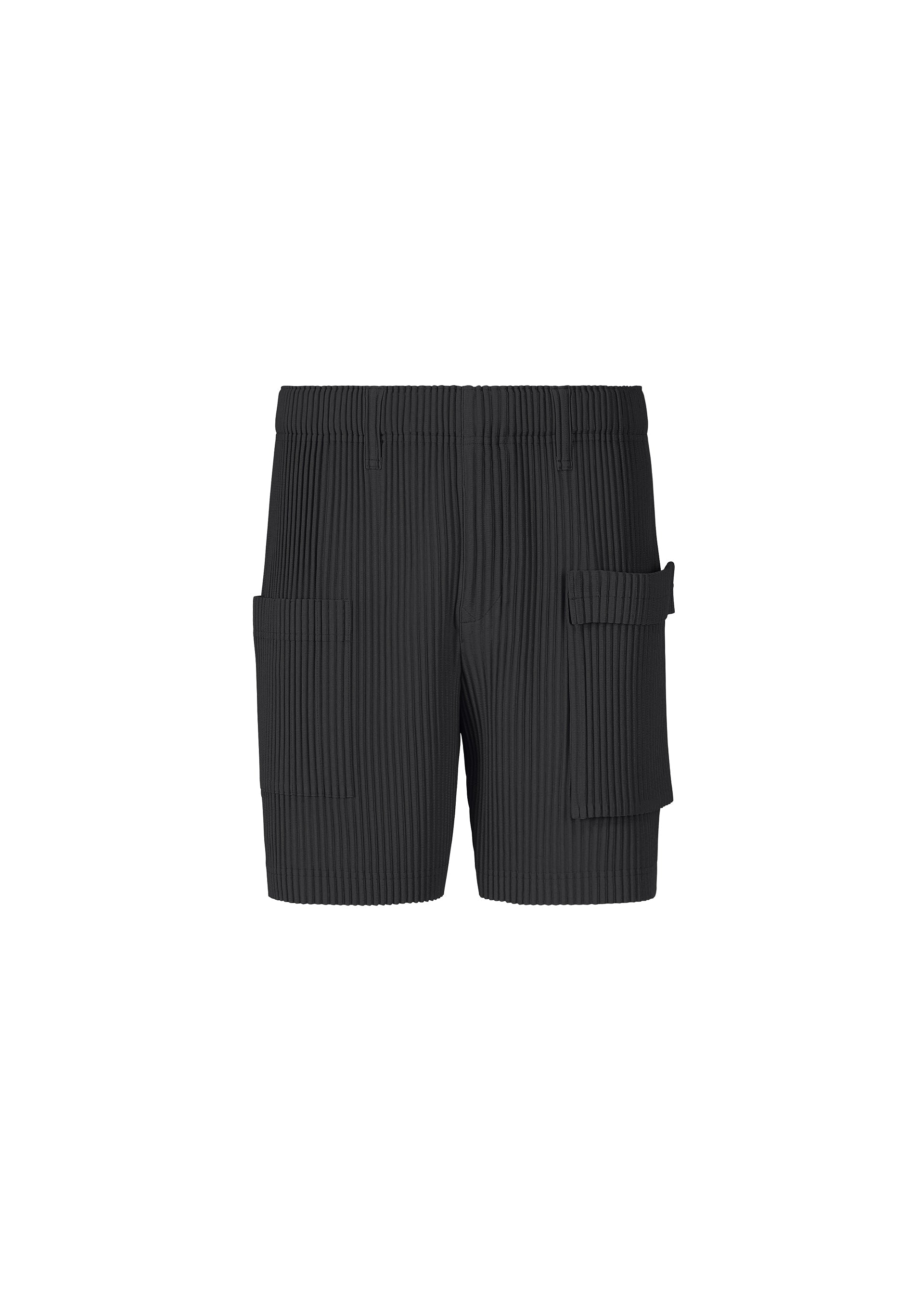 A product shot of the HOMME PLISSÉ ISSEY MIYAKE PAINTER'S GEAR trousers in black (15).