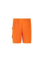 A detail shot of the HOMME PLISSÉ ISSEY MIYAKE PAINTER'S GEAR trousers.