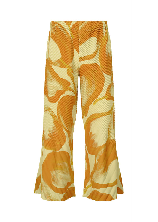A product shot of the HOMME PLISSÉ ISSEY MIYAKE FRUITS & VEGETABLES trousers in yellow (52).