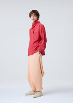 A model wears the HOMME PLISSÉ ISSEY MIYAKE PLEATS BOTTOMS 1 clothing.
