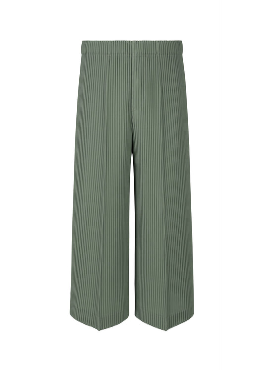 A product shot of the HOMME PLISSÉ ISSEY MIYAKE PLEATS BOTTOMS 2 trousers in lucca storico blue (73).