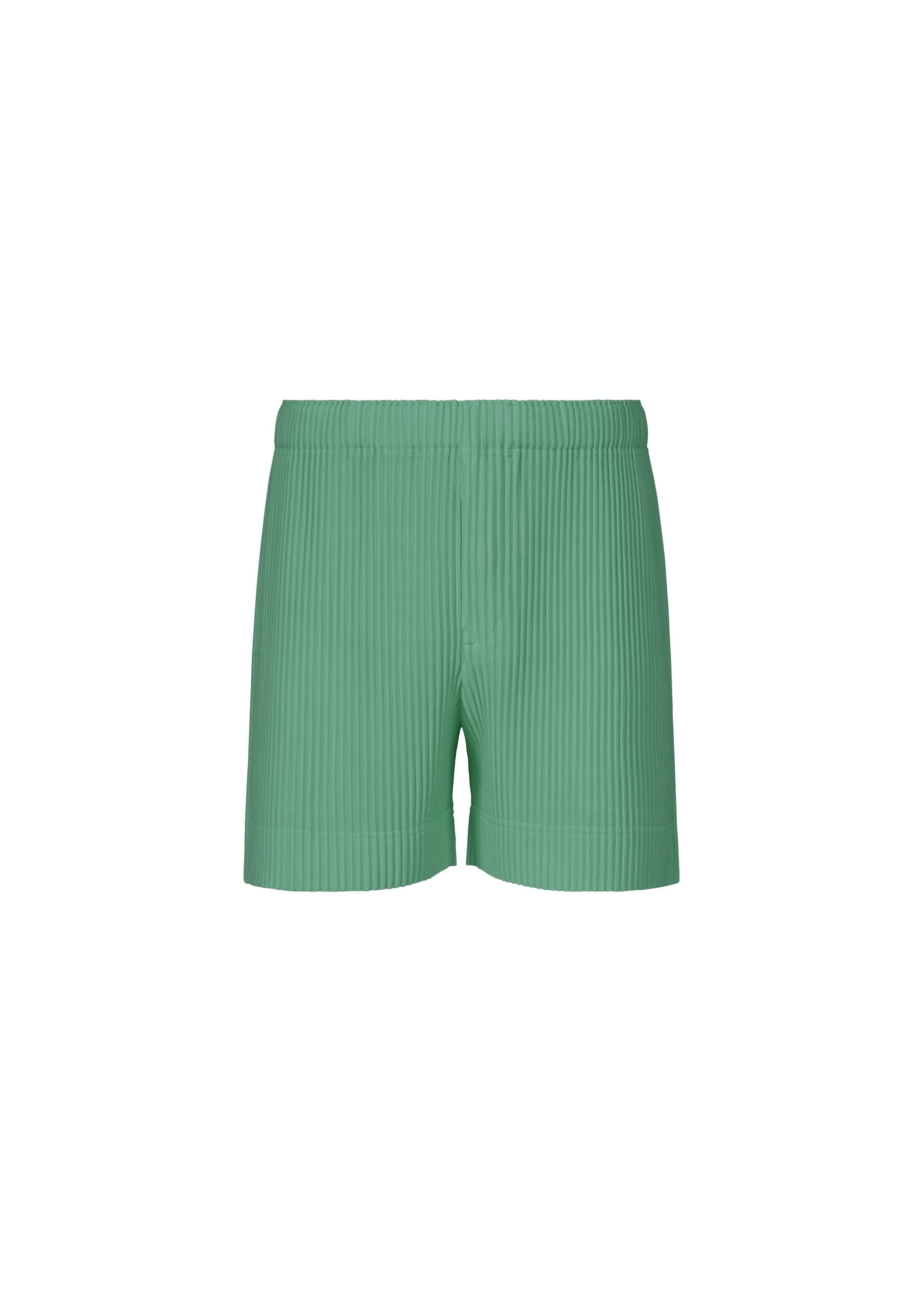 A product shot of the HOMME PLISSÉ ISSEY MIYAKE COLORFUL PLEATS BOTTOMS trousers in storico post green.