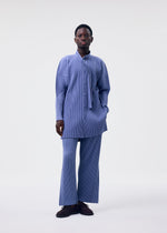 A model wears the HOMME PLISSÉ ISSEY MIYAKE MONTHLY COLORS FEBRUARY shirt.