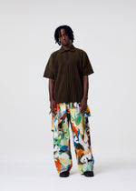 A model wears the HOMME PLISSÉ ISSEY MIYAKE MONTHLY COLORS : JUNE monthly-colors-june-shirt-black.