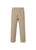 A product shot of the HOMME PLISSÉ ISSEY MIYAKE INLAID KNIT trousers in beige (40).