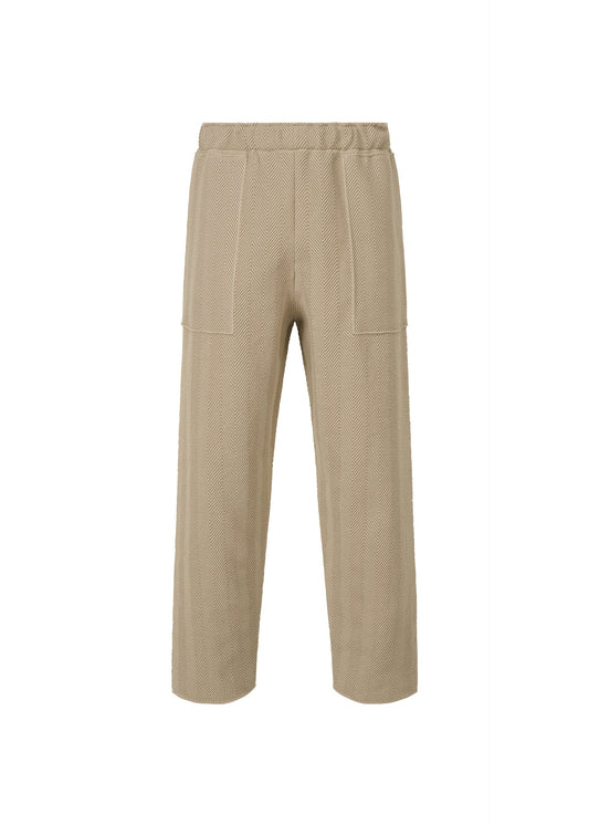 A product shot of the HOMME PLISSÉ ISSEY MIYAKE INLAID KNIT trousers in beige (40).