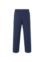 A product shot of the HOMME PLISSÉ ISSEY MIYAKE INLAID KNIT trousers in blue (72).