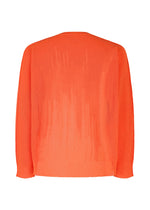 A detail shot of the HOMME PLISSÉ ISSEY MIYAKE BRUSH CLOSE UP KNIT top.