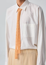 A model wears the HOMME PLISSÉ ISSEY MIYAKE MESH PLEATS TIE mesh-pleats-tie-tie-white.