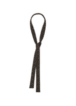 A product shot of the HOMME PLISSÉ ISSEY MIYAKE MESH PLEATS TIE tie in black.