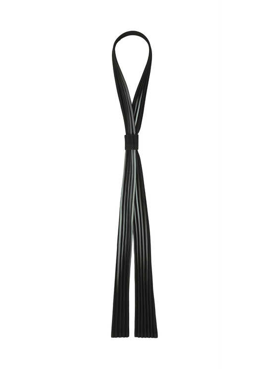 A product shot of the HOMME PLISSÉ ISSEY MIYAKE IN THE SHADOW PLEATS TIE tie in shadow black.