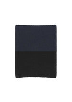 A product shot of the HOMME PLISSÉ ISSEY MIYAKE WINTER GEAR : COLOR BLOCK cap in navy.