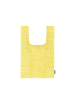 A product shot of the HOMME PLISSÉ ISSEY MIYAKE MESH PLEATS BAG tote in yellow.