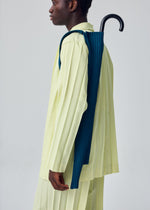 A model wears the HOMME PLISSÉ ISSEY MIYAKE UMBRELLA PLEATS BAG umbrella-pleats-bag-tote-grey-purple.