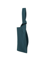 A detail shot of the HOMME PLISSÉ ISSEY MIYAKE UMBRELLA PLEATS BAG tote.