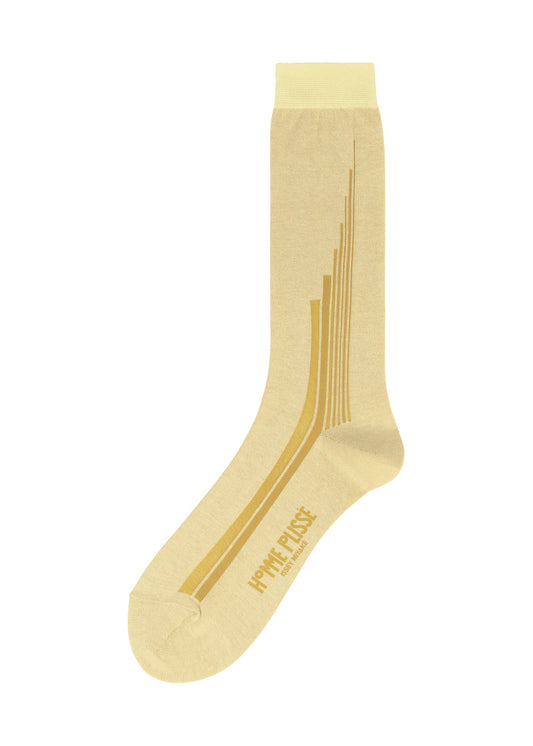 A product shot of the HOMME PLISSÉ ISSEY MIYAKE RAY SOCKS socks in yellow beige.